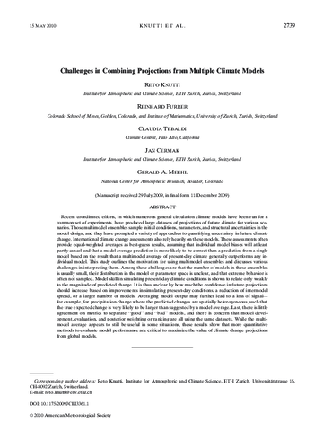 Challenges in combining projections from multiple climate models